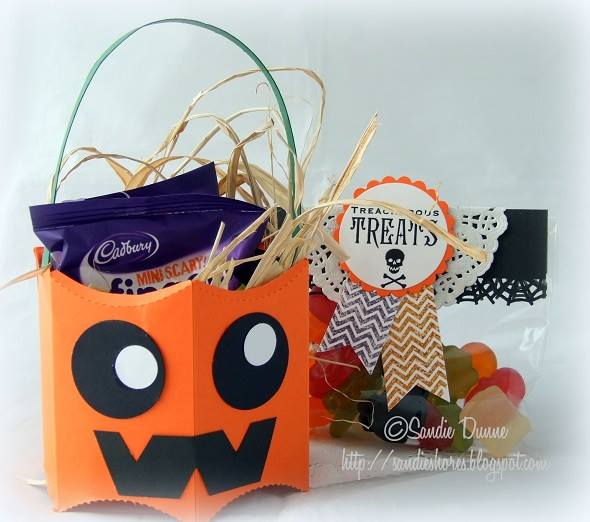 How can you decorate paper bags for Halloween?