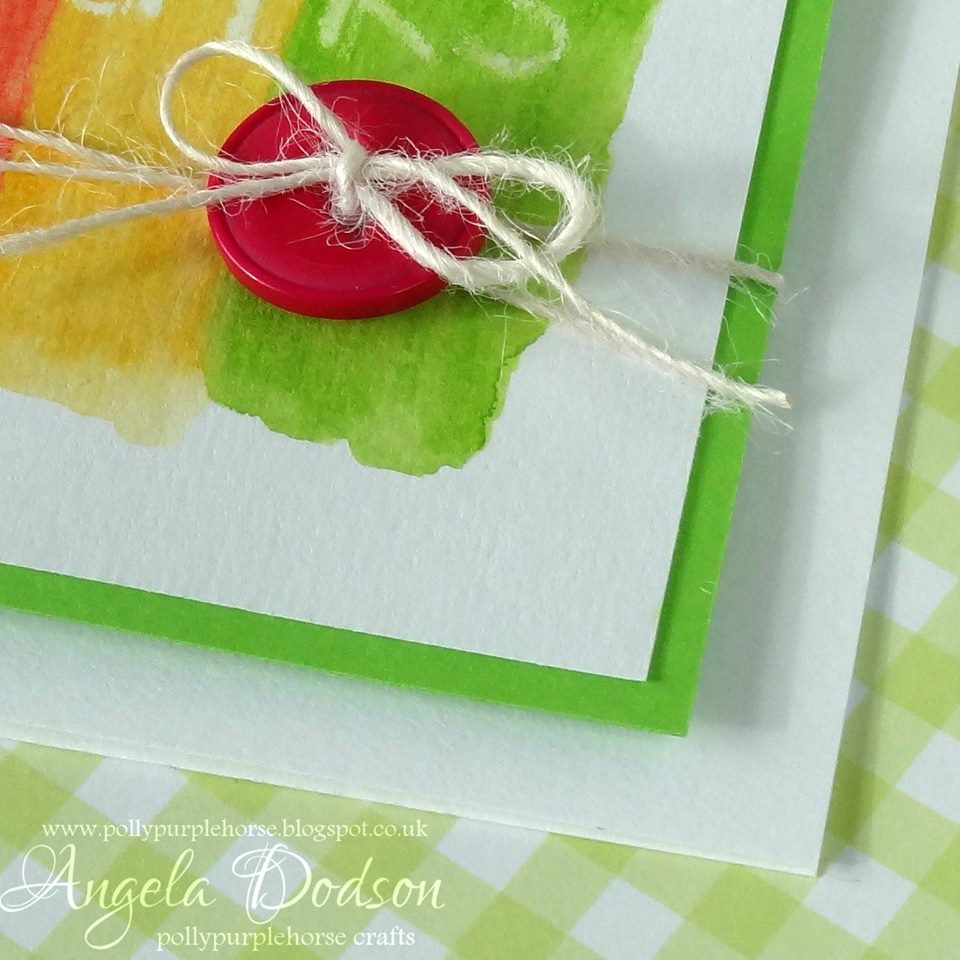 button and twine detail on a handmade card